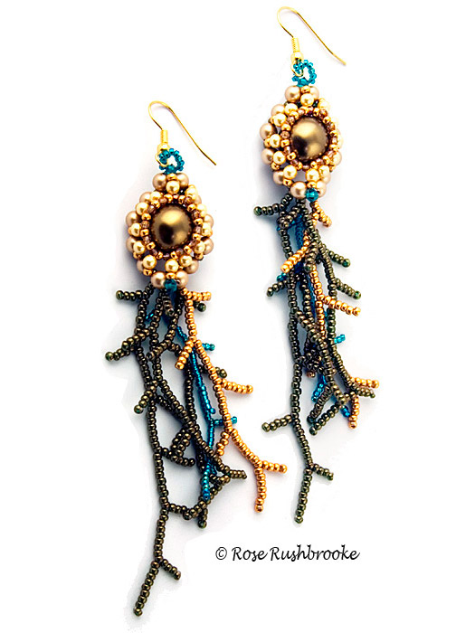 Chrysogonum, gold and green earrings - cubic right angle weave bead stitch. Made with seed beads, crystals, and glass pearls. Image copyright &copy; Rose Rushbrooke.