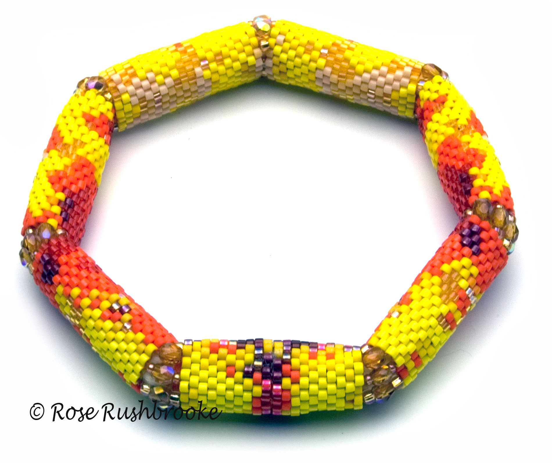 Monsella Tulip Bracelet by Rose Rushbrooke. Bead weaving using delicas, seed beads and fire polish crystals, peyote stitch. Image copyright &copy; Rose Rushbrooke.