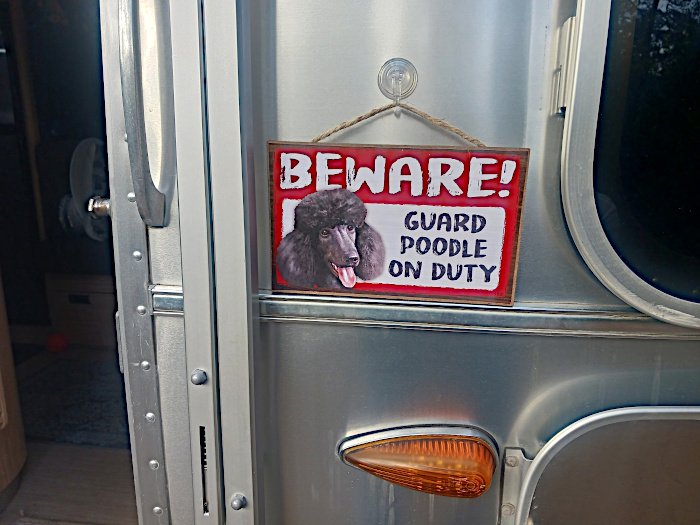 Guard poodle on duty sign. Image copyright &copy; Rose C Rushbrooke.