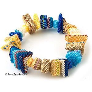 Rabbit Hole bangle by Rose Rushbrooke. Bead weaving. Glass seed beads. Image copyright © Rose Rushbrooke.