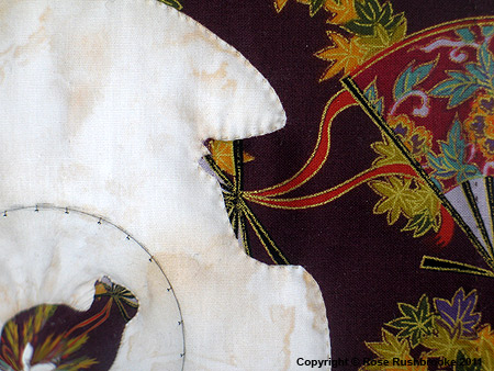 Detail 1 of Anamorphic Cat - catoptric perspective, conical mirror quilt. Image copyright &copy; Rose Rushbrooke.