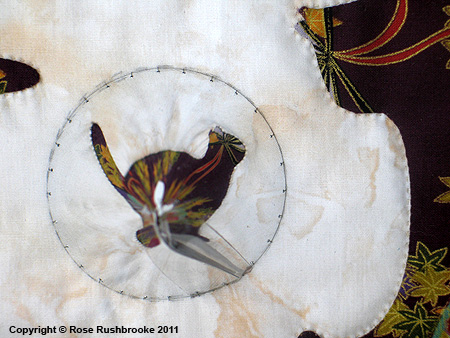 Detail 3 of Anamorphic Cat - catoptric perspective, conical mirror quilt. Image copyright &copy; Rose Rushbrooke.