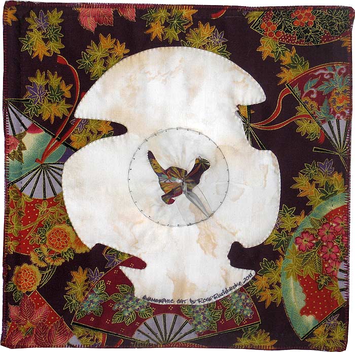 Anamorphic Cat - catoptric perspective, cylindrical mirror quilt by Rose C Rushbrooke, hand stitched, commercially printed cotton and flexible mirror. Image copyright &copy; Rose C Rushbrooke.