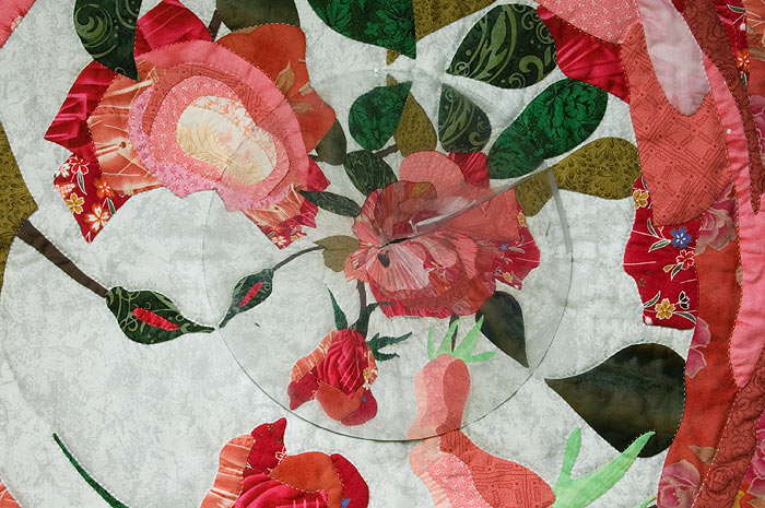 Reflection of rose bunch in the conical mirror. Image copyright &copy; Rose Rushbrooke.