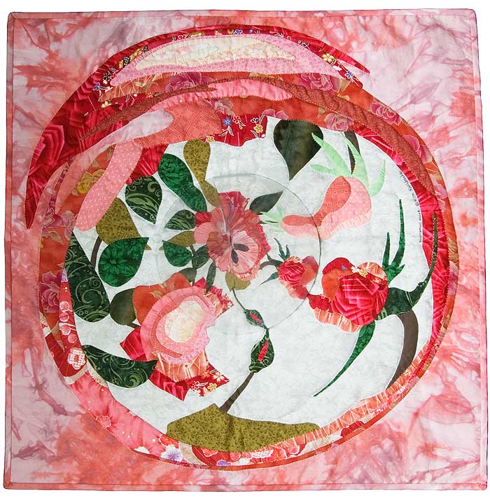 Anamorphic Roses - catoptric perspective, cylindrical mirror quilt by Rose C Rushbrooke, hand stitched, commercially printed cotton and flexible mirror. Image copyright &copy; Rose C Rushbrooke.